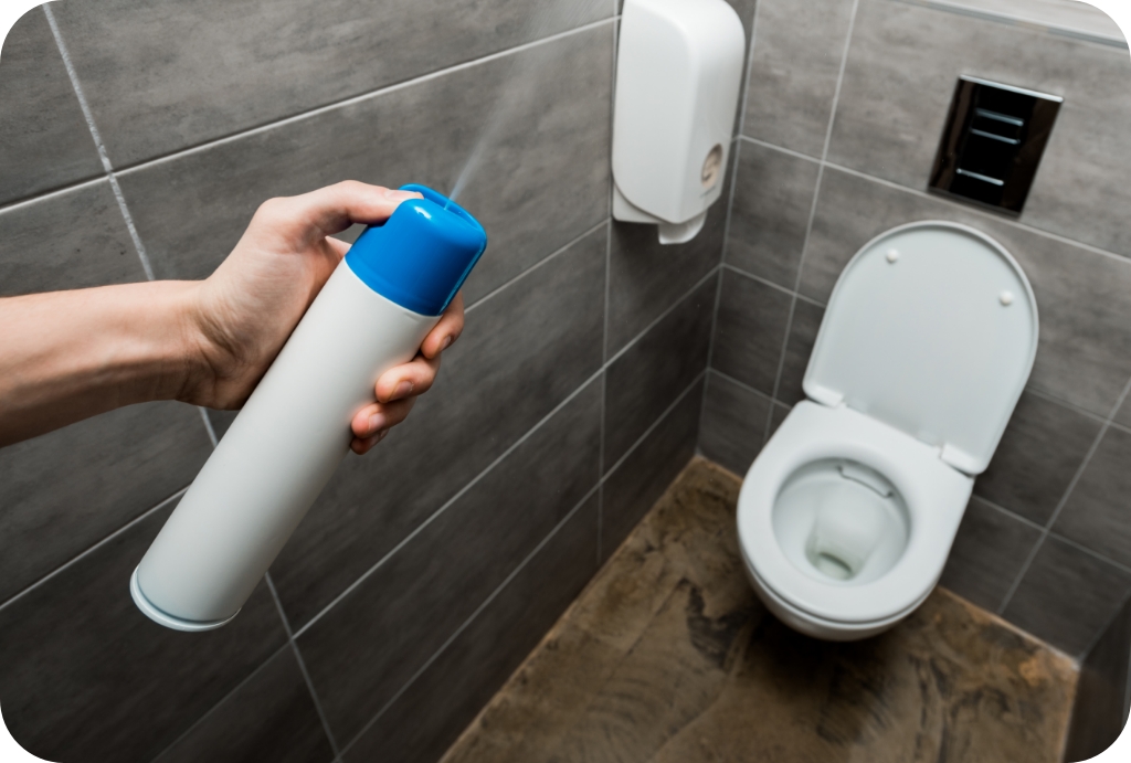 Routine commercial bathroom cleaning in an office or shared facility.