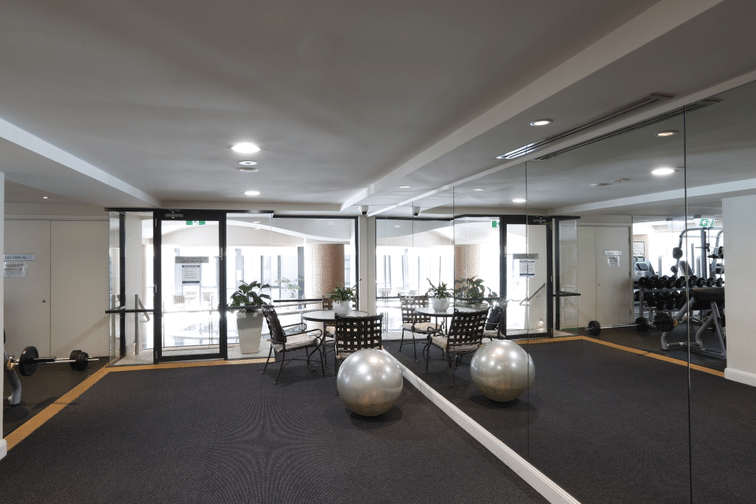 Communal strata gym cleaned and maintained by Pharo Cleaning.