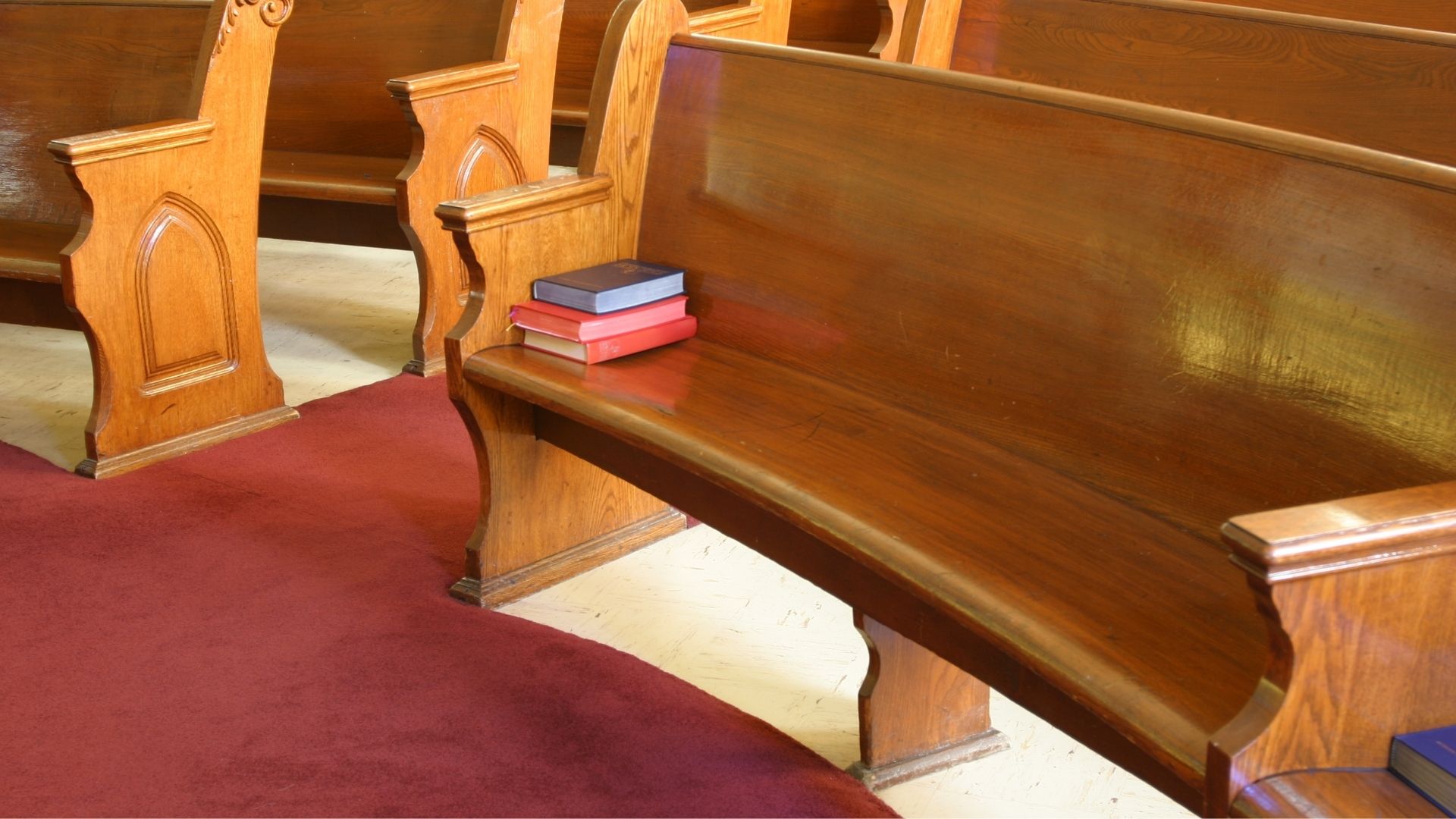 Clean and polished wooden church pews as part of professional church cleaning by Pharo Cleaning.